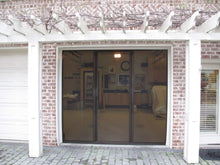 Load image into Gallery viewer, 8'W x 8'H Lifestyle Screens® Garage Screen Door, with Standard 18x14 Charcoal Fiberglass Screen Fabric and With Center Passage Door