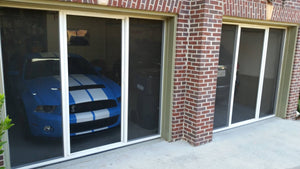 10'W x 7'H Lifestyle Screens® Garage Screen Door, with Standard 18x14 Charcoal Fiberglass Screen Fabric and With Center Passage Door